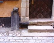 A preserved medieval waste pipe in Stockholm Old Town used to guide sewage onto the street where rain eventually would carry it away.