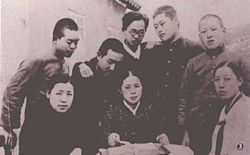 Sun Myung Moon (third from left) with a missionary and group of church members at Myung Su Dae Church during his student days in Seoul, ca. 1940.