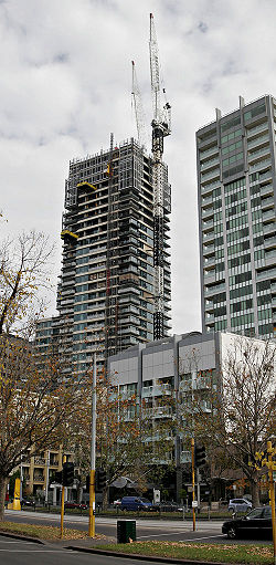 Cranes are essential for large construction projects, such as this skyscraper