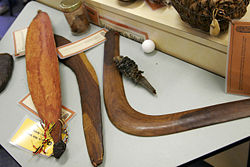 These implements were used only by men. At left, a spear-thrower (called woomera in the Eora language), and two examples of boomerangs. Boomerangs could be for hunting (most were non-returning), or purely for music and ceremony.
