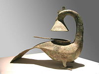 Bronze lamp in the shape of feng-huang, National Museum of China, Beijing.