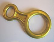 This figure-8 descender, used in rock climbing, is anodized with a yellow finish. Climbing equipment is available in a wide range of anodized colors.