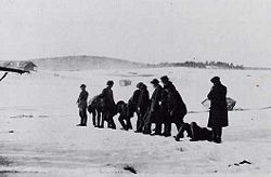 White firing squad executing Red soldiers in Länkipohja