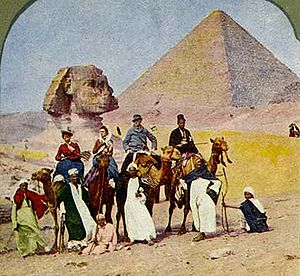 Nineteenth-century tourists in front of the Sphinx - view from South-East, Great Pyramid in background