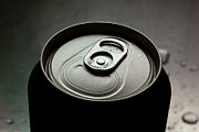 The stay-tab opening mechanism characteristic of post-1970s drinking cans.